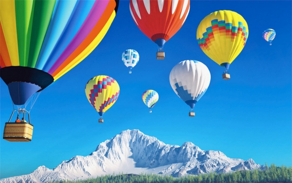 Фотообои FTXL-11-00010 Разноцветные воздушные шары в небе над горой