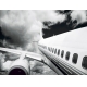 Фотообои FTP-4-11-00005 Самолет в черно-белых облаках №1
